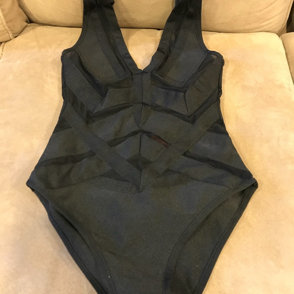 Black one piece size medium